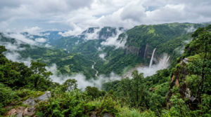 Cherrapunji travel guide with misty Meghalaya hills during monsoon - BlueJay Explorations